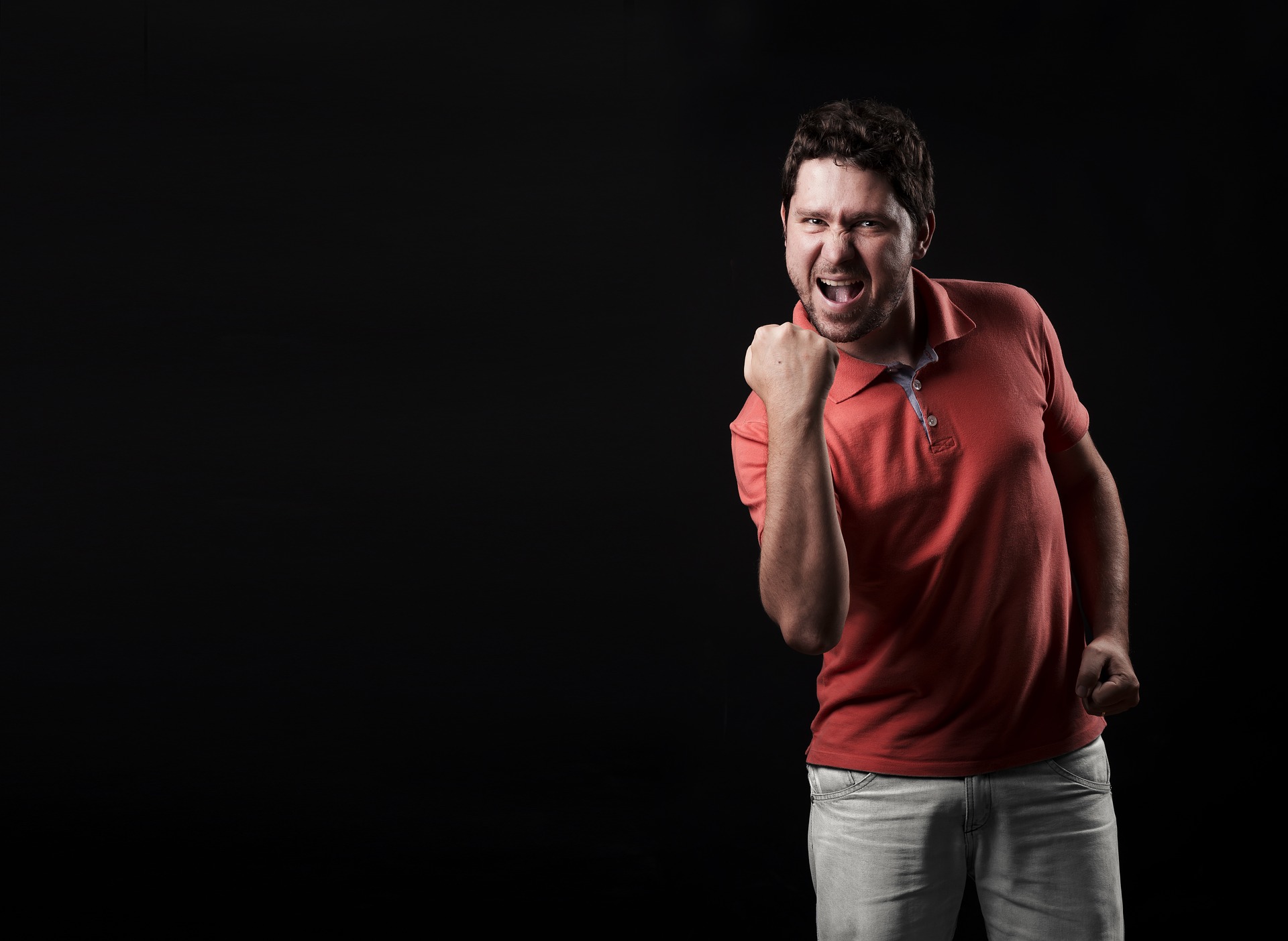 Man showing how happy he is after his achievements